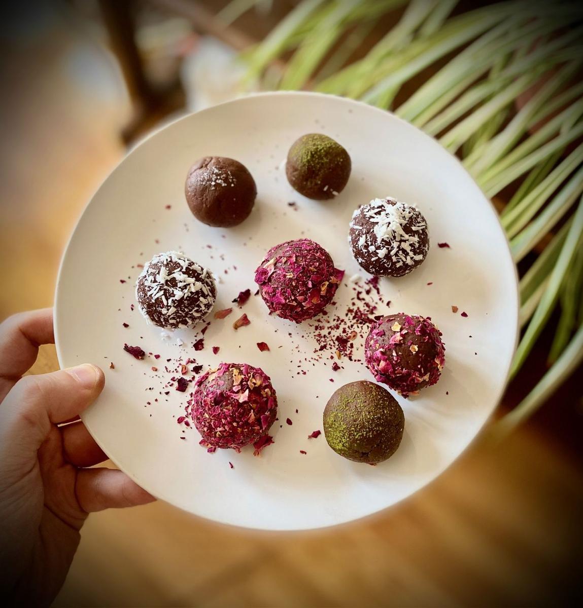 Energy bites rolled in rose petals