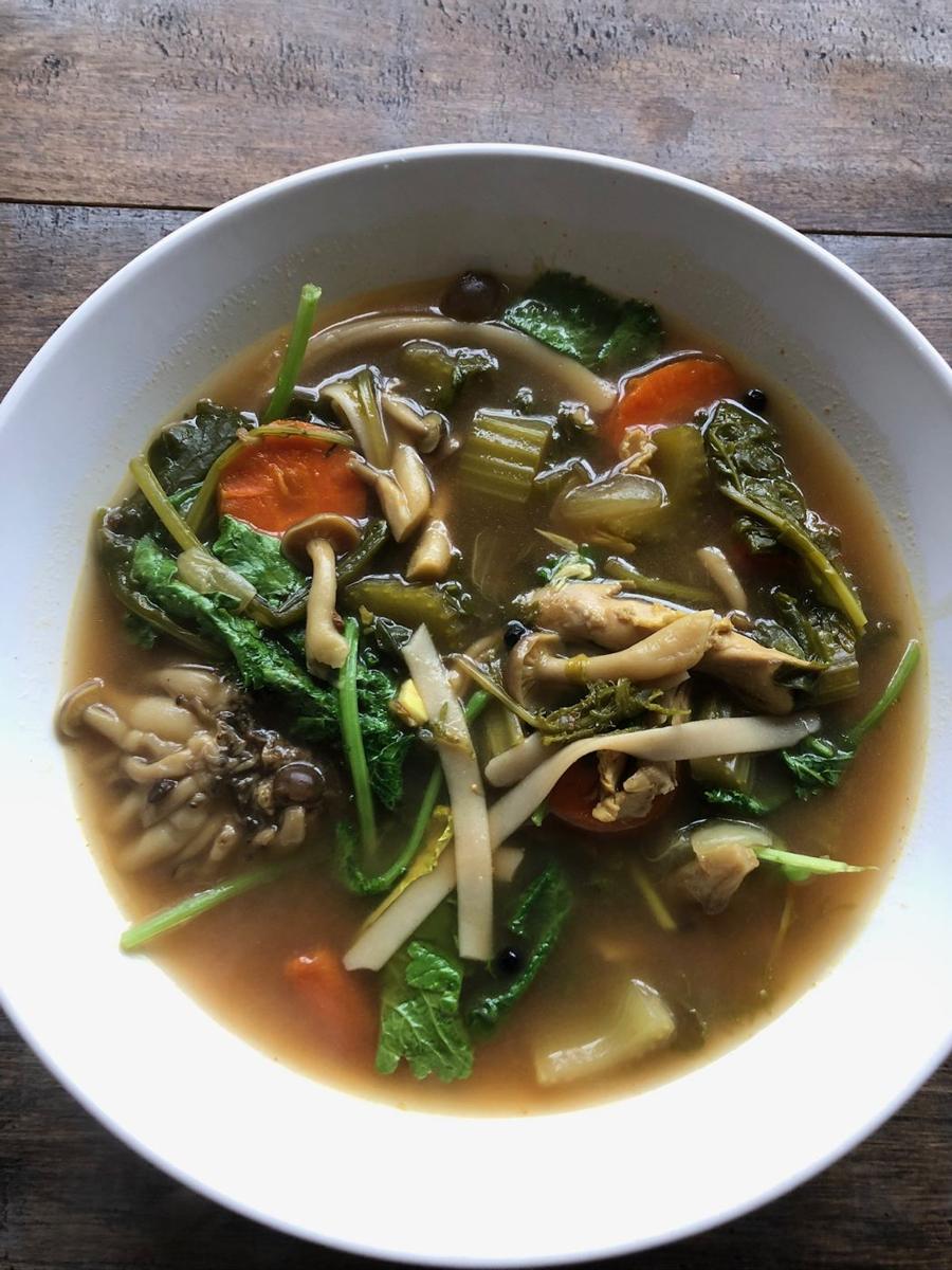 Broth with mushrooms and greens